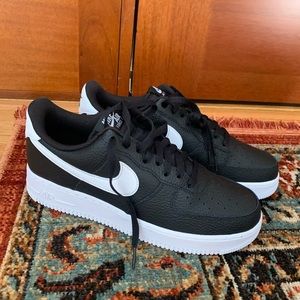Nike Air Force 1 black leather sneakers, size 10 men’s